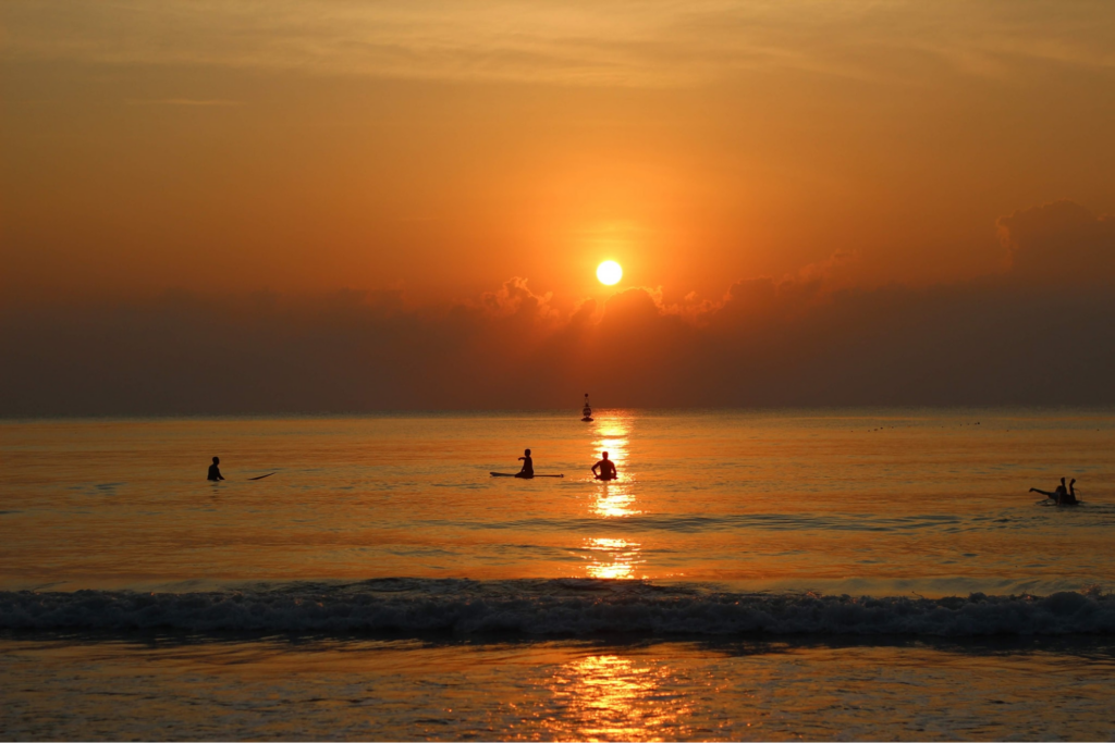 Khao Takiab Beach at the southern end of Hua Hin, with fishing boats and the hill behind